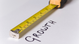 A ruler measuring the worth "growth." (Success Through Failure episode 315: How Google's Rules for Innovation Can Be Used to Hack Personal Performance and Breakthrough)