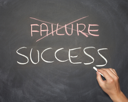 A person who crossed out the word "failure" then wrote "success" below it (Success Through Failure episode 391: Unlocking the Science of Success Through Failure: Insights from Harvard Business Review and Kellogg School of Management)